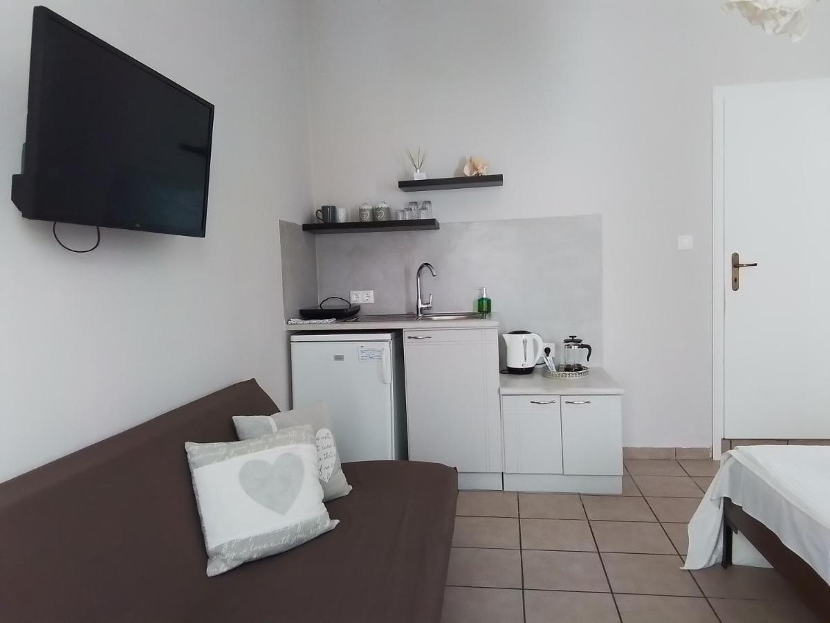 Morpheus Rooms Kini Eksteriør billede